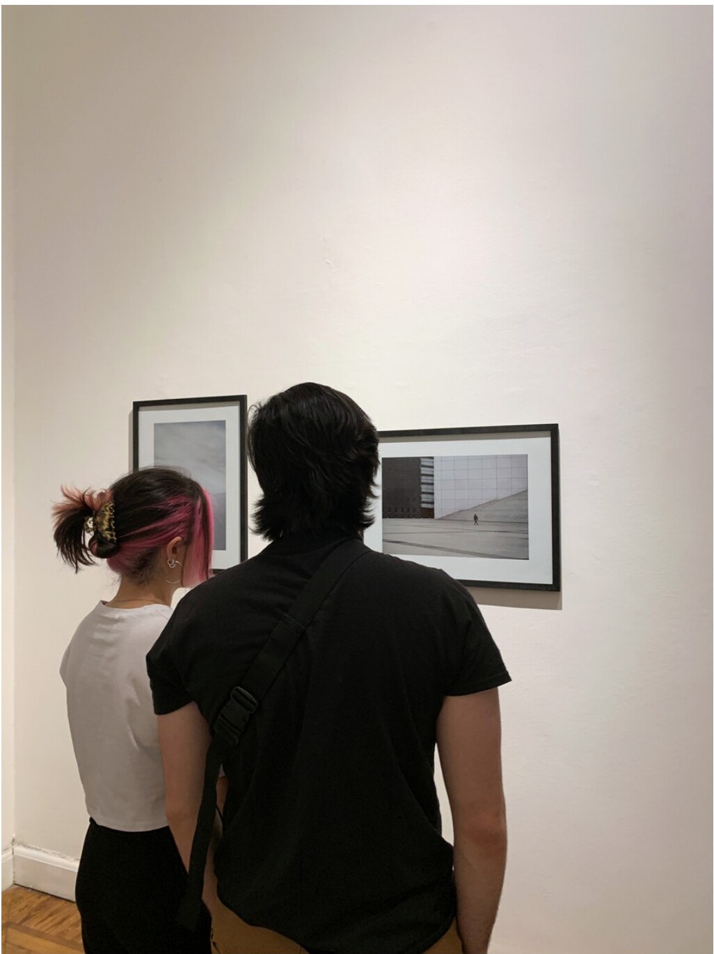 Detail of framed works on the wall